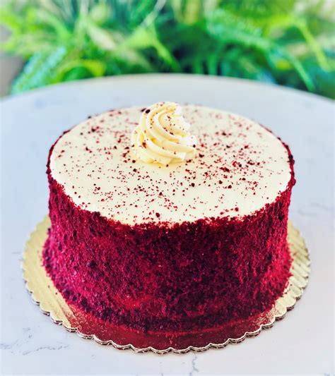 Red velvet bakery - Red Velvet Cake. Preheat the oven to 350F and grease and line two 8” (or 9”) cake pans. Wrap the pans in damp cake strips if you have them. In a measuring glass, combine the milk and vinegar. Set aside. In a medium bowl, whisk together the flour, cornstarch, cocoa powder, milk powder, baking powder, and salt.